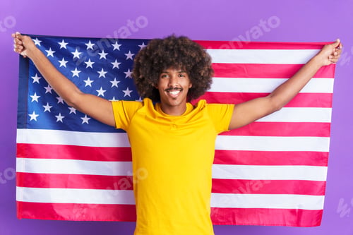 Preview: Happy african man raising a north america national flag