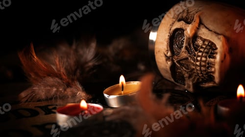 Preview: Creepy Skull on a Witchcraft Ouija Board and Candles