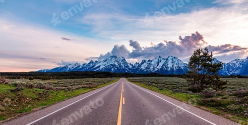 Preview: Scenic Road Leading to Snow-Capped Grand Teton Mountains
