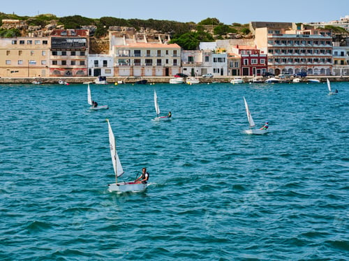 Preview: Five small sailboats for one at sea near the coast of Menorca, Spain