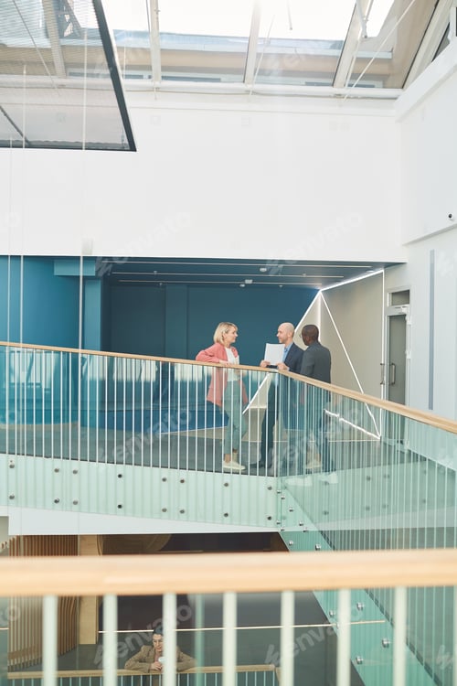 Preview: Office building with business people