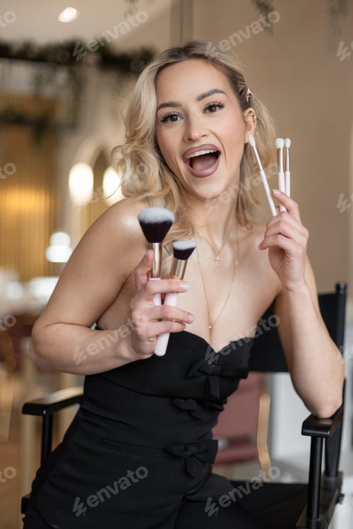 Preview: Fashion beautiful sexy makeup artist glamorous woman model in fashionable black outfit