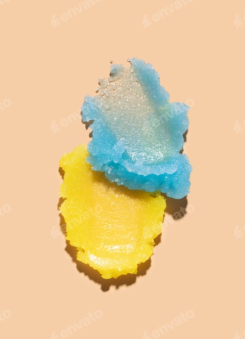 Preview: cosmetic smears scrub cream texture on a beige background