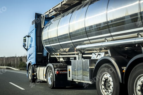 Preview: Long vehicle truck with tank trailer on a highway.