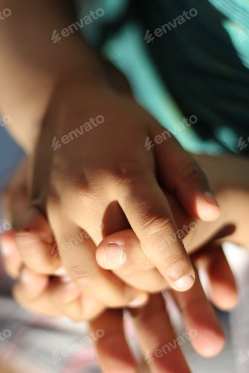 Preview: Mom holding her son hands