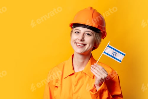 Preview: woman worker in helmet and orange overalls holding Israel flag