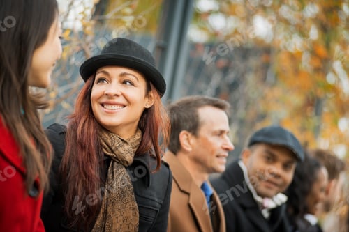 Preview: City life,a group of people on the go,using mobile phones