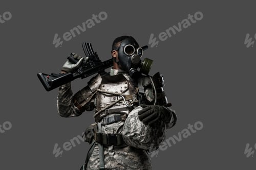 Preview: Armed soldier of african descent with gas mask and rifle