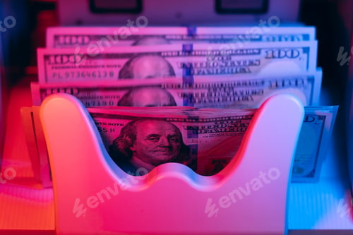 Preview: Money. Machine counting dollars