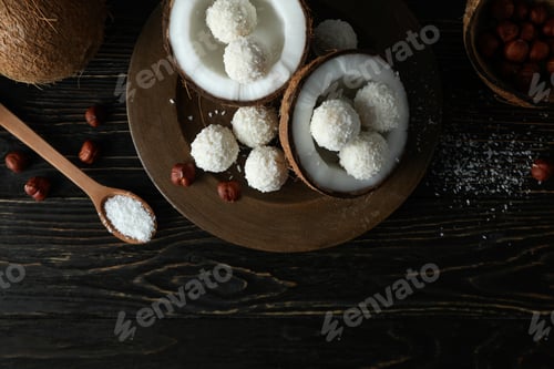 Preview: Concept of tasty sweets, coconut candies, top view