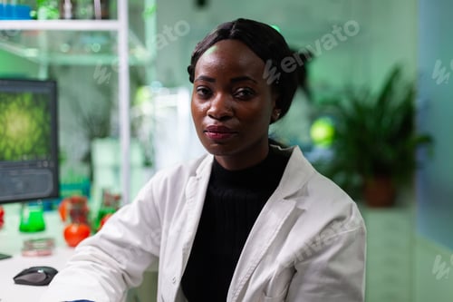 Preview: Portrait of african american botanist scientific doctor looking into camera