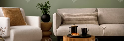 Preview: Stylish composition of living room interior with green wall, grey sofa with pillow.