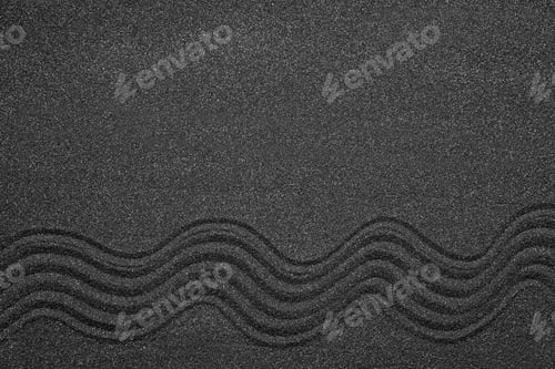 Preview: Top view of beautiful black sand. Zen and harmony