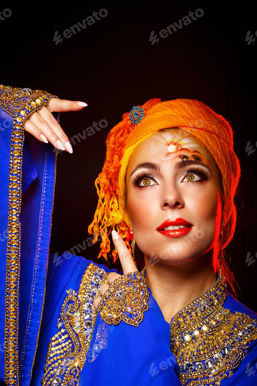 Preview: Portrait Of Oriental Beauty With Face Art And National Costumes. Girl Dressed In Jellabiya And
