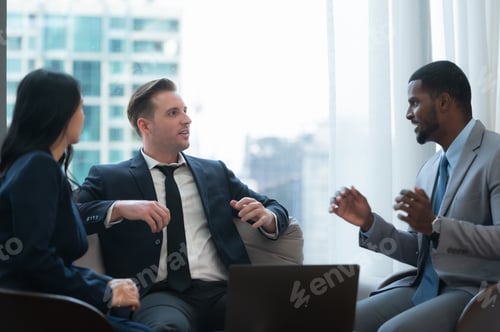 Preview: New business group discuss and exchange ideas while relaxing in the office room.
