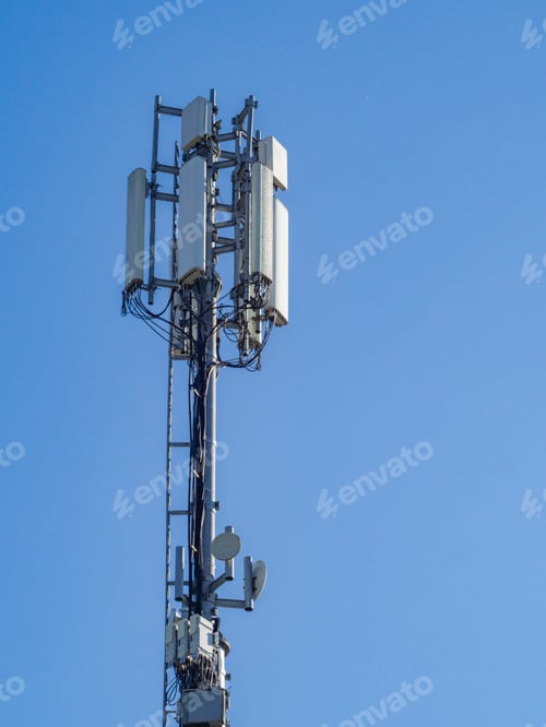 Preview: Cellular base station tower with microwave dishes providing wireless communication services