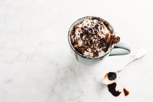 Preview: Hot chocolate in cup with whipped cream