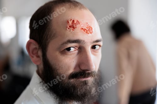 Preview: Portrait of man with bloody zombie wound