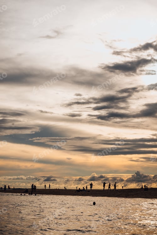 Preview: People silhouettes against sunset