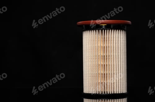 Preview: Car engine filter on dark background, close up