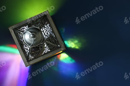 Preview: Decorative Arabic lantern on color background, top view. Space for text