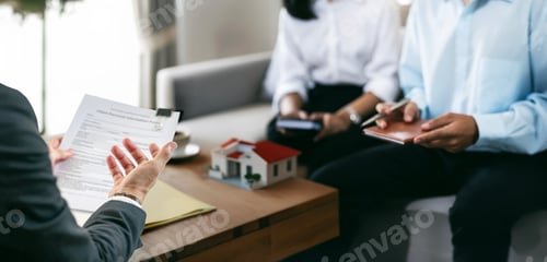 Preview: Real estate agent having a discussion with his client about purchasing house. and signing contact.