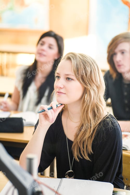 Preview: High school students listening to lecture in classroom