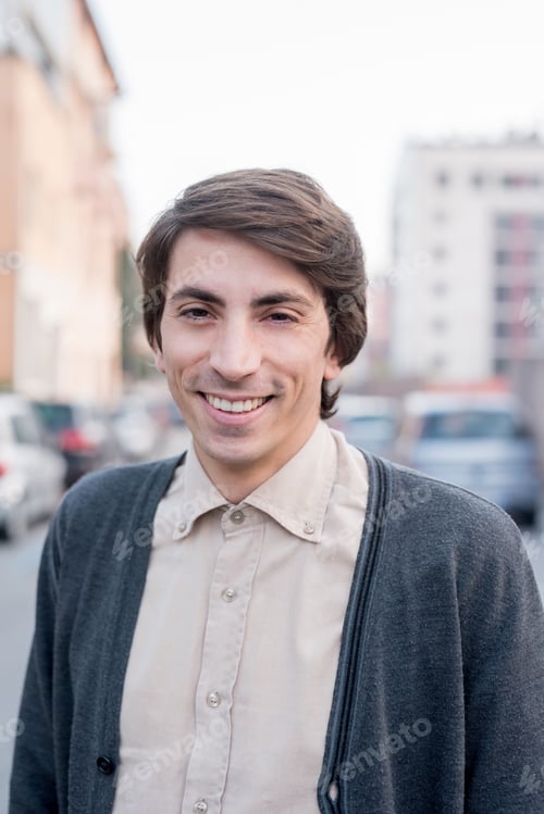 Preview: Confident young millennial portrait outdoors smiling