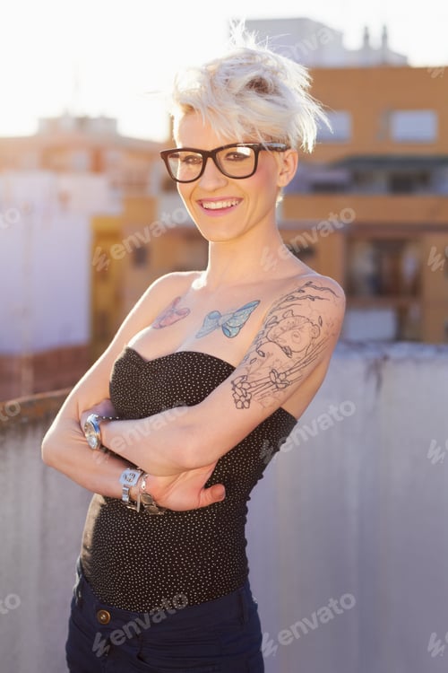 Preview: Capture my style. Shot of a young woman with tattoos.