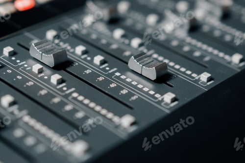 Preview: A recording studio control panel mixer with an equalizer faders buttons for broadcasting of a song