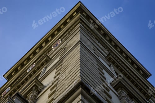 Preview: Low angle shot of a beautiful old building captured under the blue sky in Bern, Switzerland