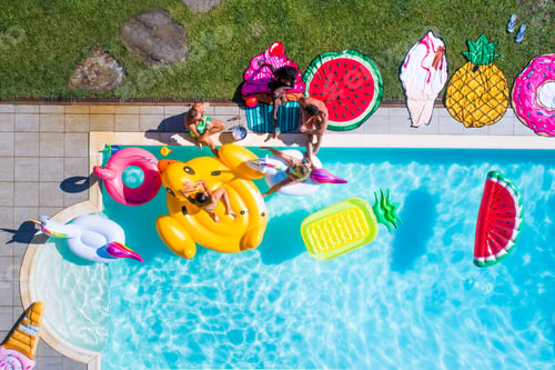 Preview: Friends having fun in a swimming pool