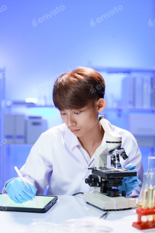 Preview: Scientist recording the results of the study in a laboratory journal.