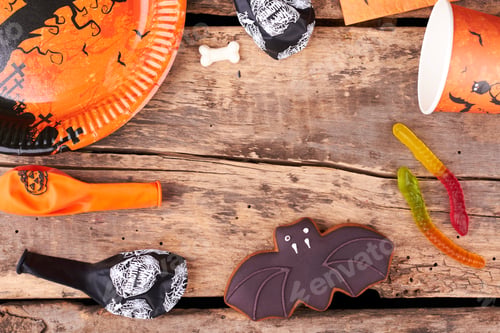Preview: Halloween holiday background with sweets and decorations.