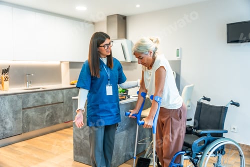Preview: Nurse helping senior woman using crutches for rehabilitation