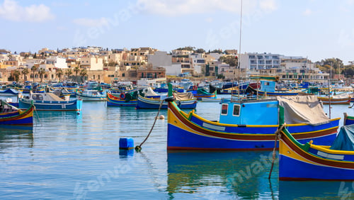 Preview: Marsaxlokk fishermen village in Malta. Traditional colorful boats at the port of Marsaxlokk