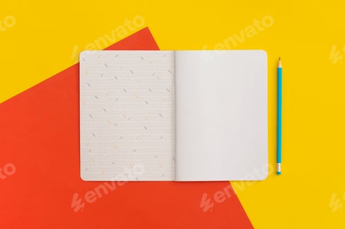 Preview: Notebook and pencil on color background. Top view. Flat lay. Back to school concept.