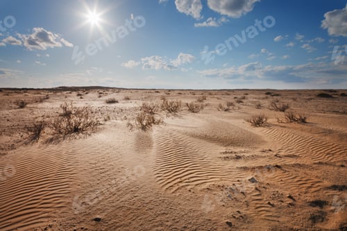 Preview: Desert under a blue sky with clouds