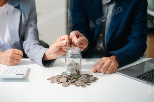 Preview: Hand putting mix coins and seed in clear bottle and business investment growth concept.