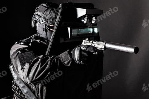 Preview: Armed SWAT fighter hiding behind ballistic shield