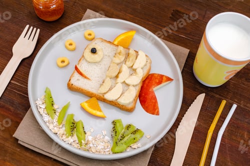 Preview: Funny cute fish shape sandwich toast bread with banana, apple,orange, Kids childrens breakfast