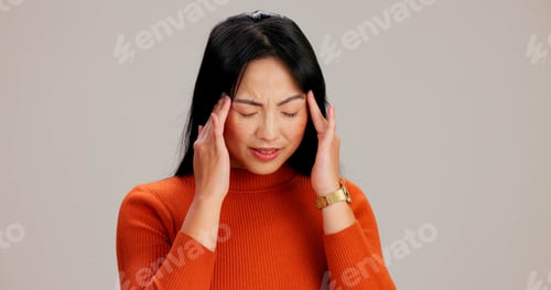 Preview: Headache, pain and brain fog with asian woman in studio for vertigo, dizzy and stress. Fatigue, mig