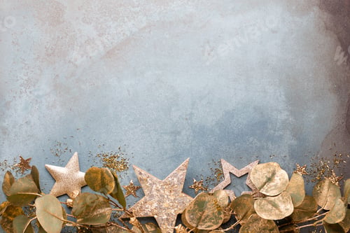 Preview: Beautiful Christmas gold flower on vintage blue background.