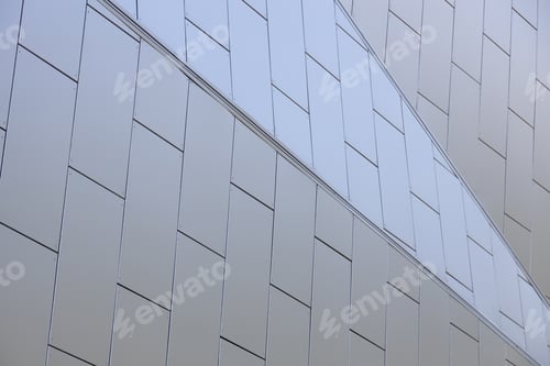 Preview: Relief white tiled wall of modern minimalistic geometrically designed building