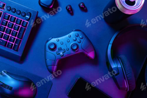 Preview: Controller with purple lit keyboard amidst various wireless devices