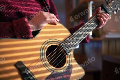 Preview: Girl with a guitar in the sunlight through the blinds.