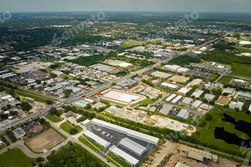 Preview: Aerial view of industrial park with goods warehouses