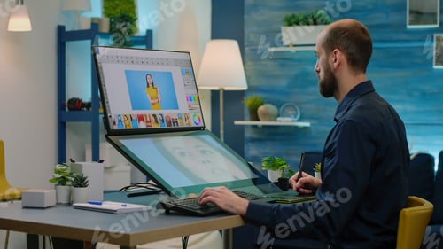 Preview: Man photographer retouching pictures on editing software