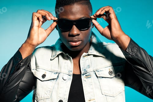 Preview: Cool Urban Stylish Black American Man. Fashion Studio Shot.