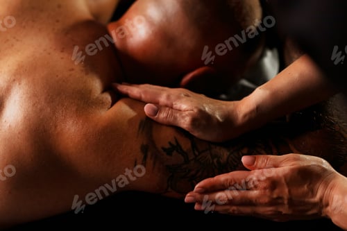 Preview: Soothing Touch During a Relaxing Indoor Massage Session for Ultimate Rejuvenation